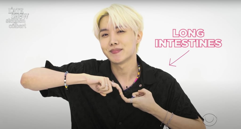 J-Hope From BTS Doing a "Long Intestines" Hand Gesture