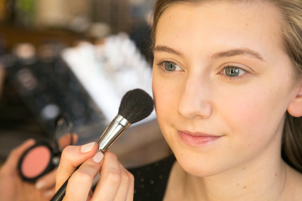 Next, Bettelli used Pro Longwear Blush in Rosy Outlook ($26) on the apples of the cheeks for a soft flush of color.