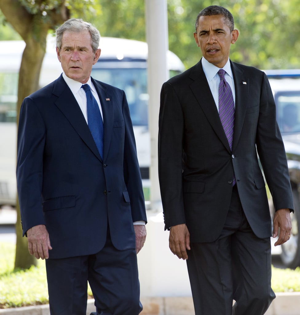 President Obama and former President George W. Bush walked together while they were both in Tanzania in July 2013.