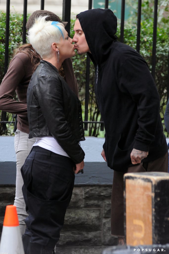 Pink and Carey Hart exchanged an adorable peck on the NYC set of her movie Thanks For Sharing in October 2011.