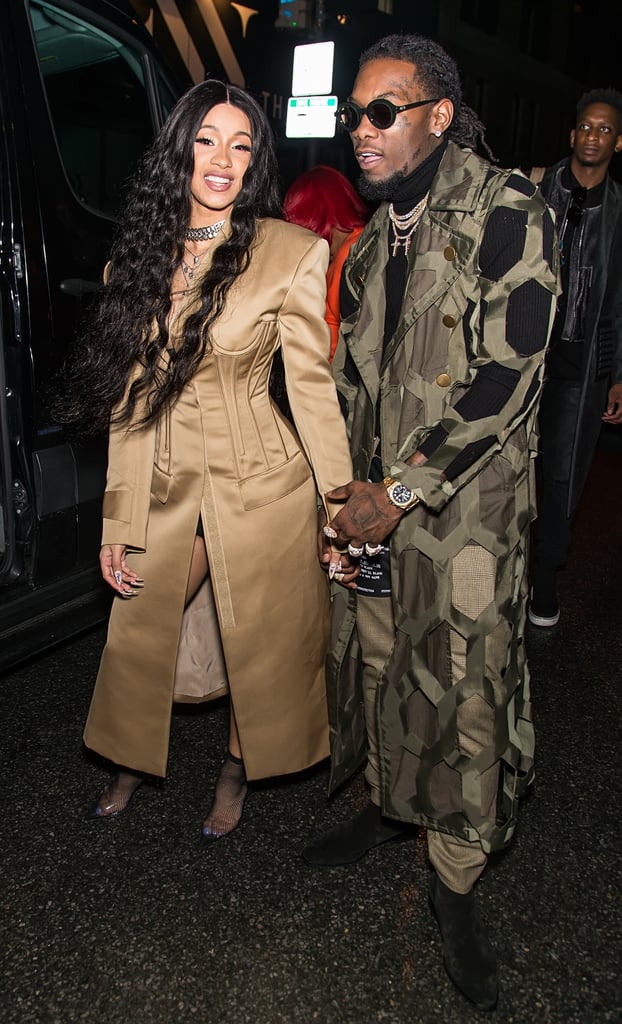 Wearing a beige trench coat-inspired dress during NYFW.