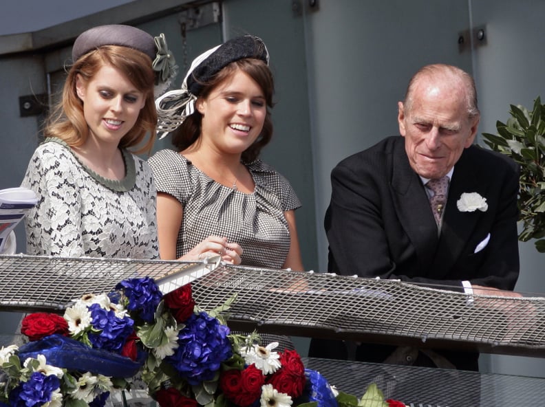 EPSOM, UNITED KINGDOM - JUNE 02: (EMBARGOED FOR PUBLICATION IN UK NEWSPAPERS UNTIL 48 HOURS AFTER CREATE DATE AND TIME) Princess Beatrice, Princess Eugenie and Prince Philip, Duke of Edinburgh watch the racing from the balcony of the Royal Box on Derby Da