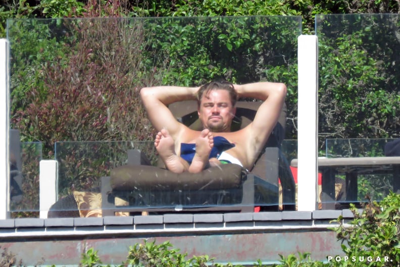 When He Was Lounging Shirtless by the Pool but All We Could Notice Was How Small His Feet Look