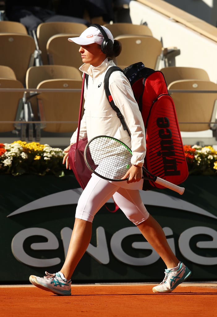 Iga Swiatek walks onto Court Philippe-Chatrier in Paris on Oct. 10 before her Women's Singles Final against Sofia Kenin.