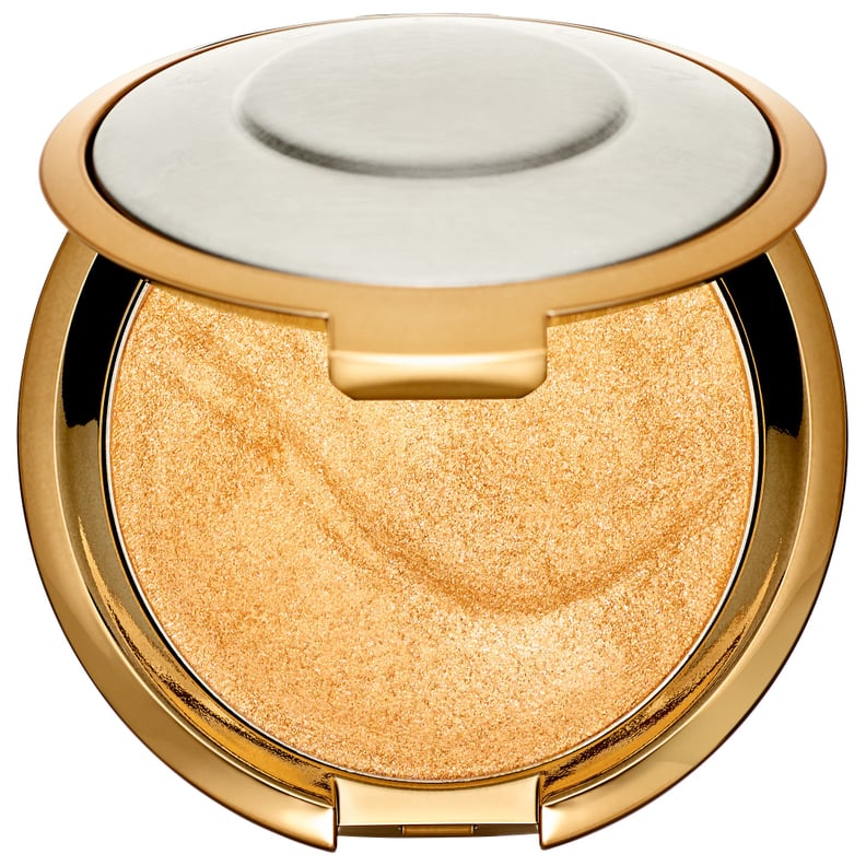 Becca Shimmering Skin Perfector Pressed Highlighter in Gold Lava