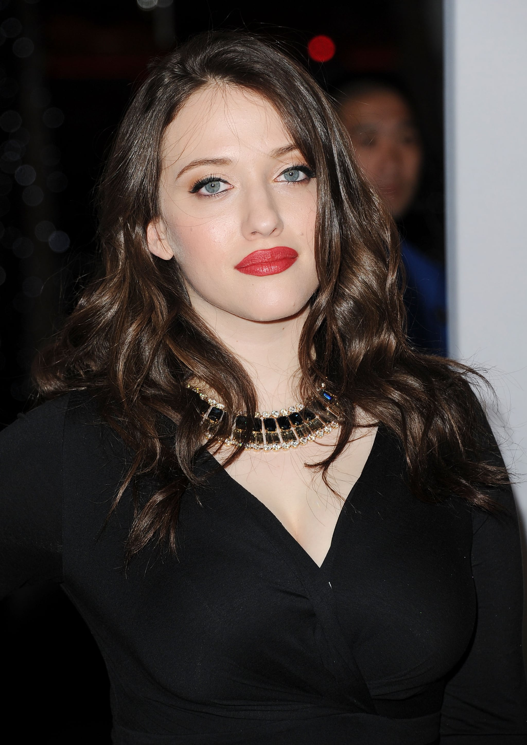 Kat Dennings had red lips at the People's Choice Awards.