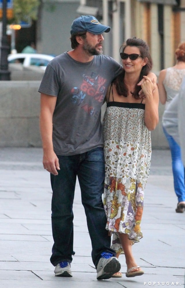 Penélope and Javier looked happy while walking down the street in Madrid in July 2012.