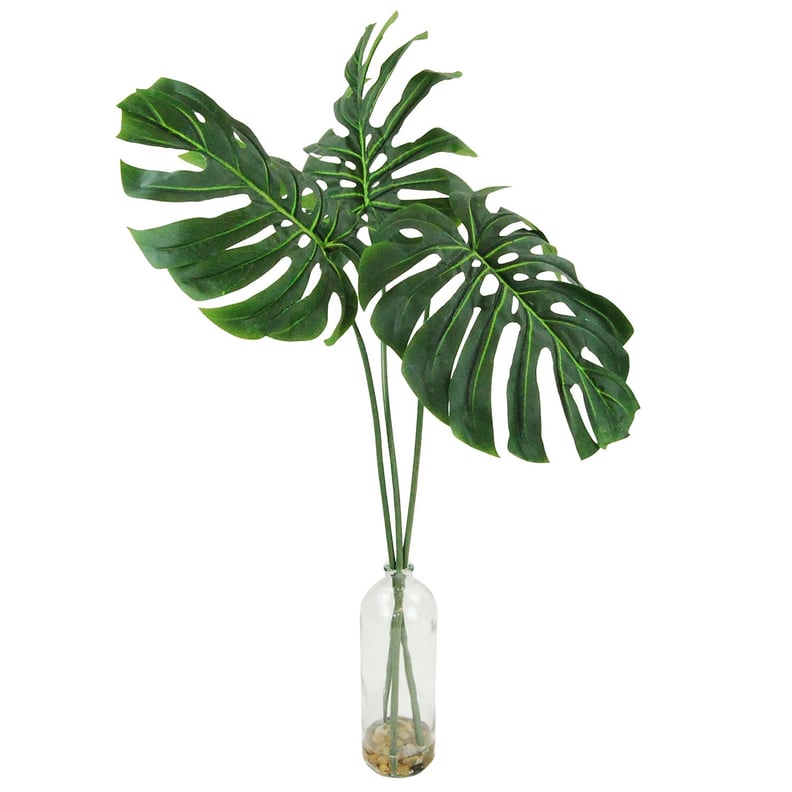 Philodendron Leaves in a Chunky Glass Bottle Silk Plant