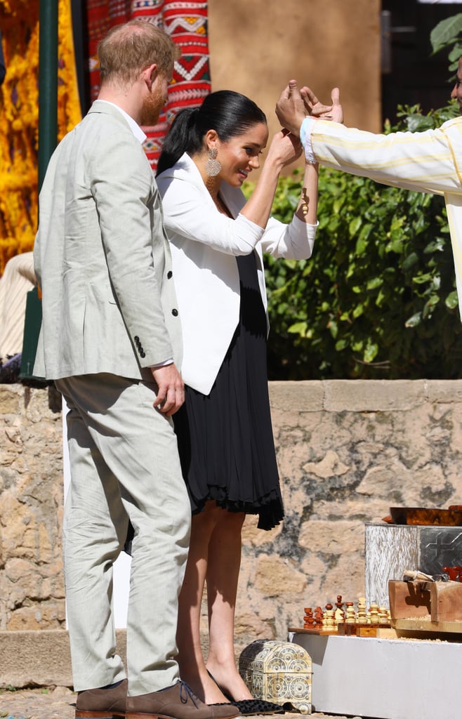 Prince Harry Helping Meghan Markle Fix Her Hair in Morocco