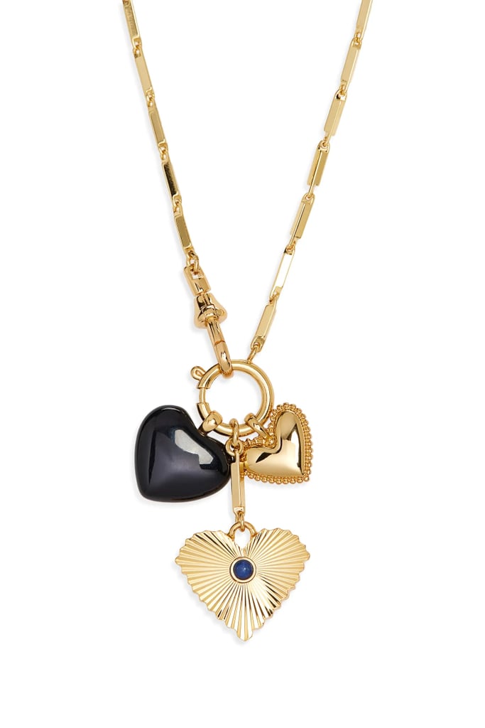 Madewell Engine Turned Lapis Heart Charm Necklace ($38, originally $58)
Nothing sparks joy quite like adding a new piece of jewelry to your rotation. This adorable heart charm necklace is no exception. Featuring three gold and dark blue hearts on a dainty chain, the design is the perfect romantic accessory.