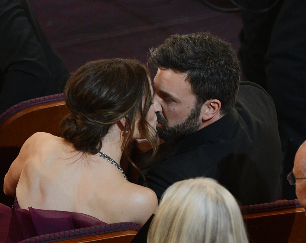 Ben and Jennifer stole a kiss in their seats during the Oscars in February 2013.