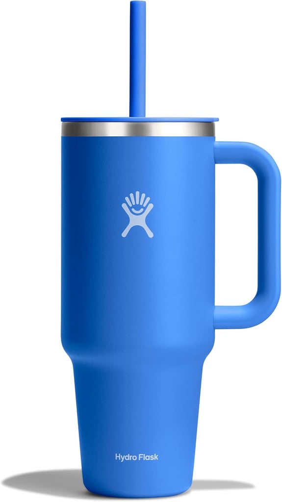 Hydro Flask Travel Tumbler With Handle ($25, originally $30)
At 28 percent off, this 40-ounce tumbler is a steal if you're in need of a new emotional support water bottle for the gym (and really, who isn't at least in the market for a new color?). It comes with insulated stainless steel and a flexible straw that's easy to sip. It also fits perfectly in most cupholders.