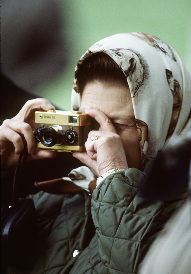 A Camera What Does Queen Elizabeth Ii Carry In Her Purse