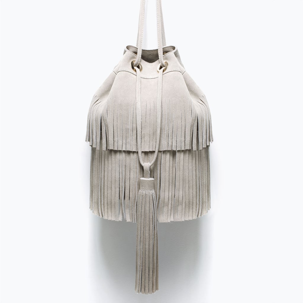 Leather bucket bag with fringes ($100)
