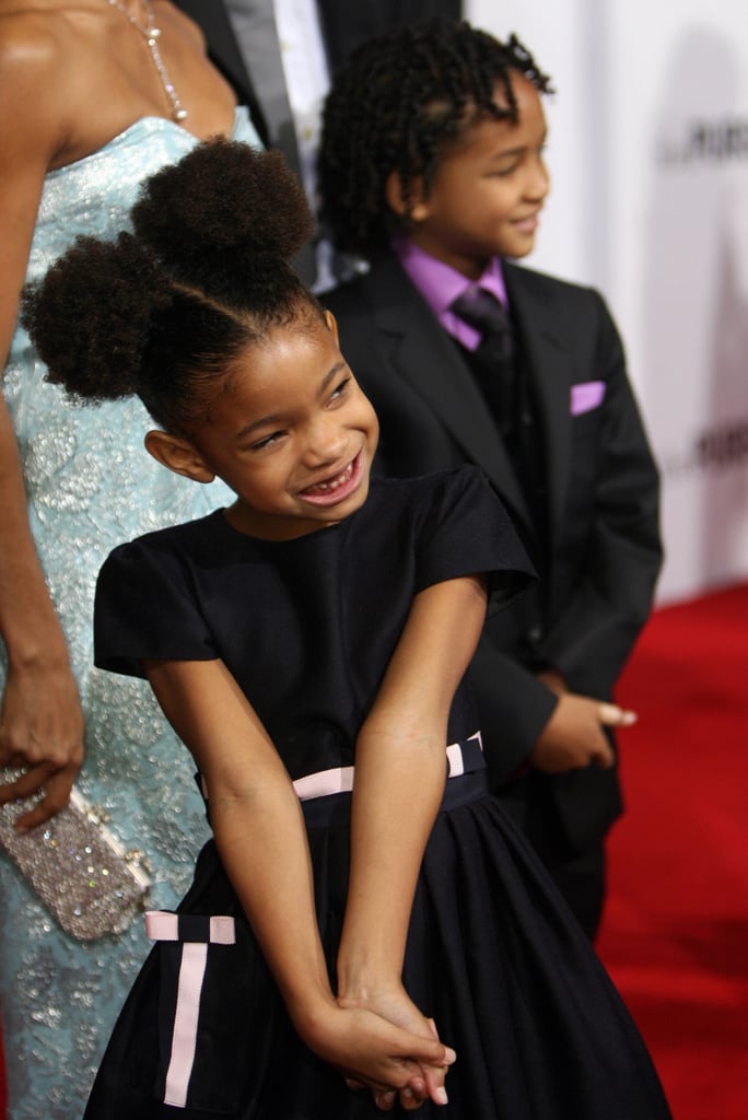 As a child, Willow looked adorable with Afro puffs.