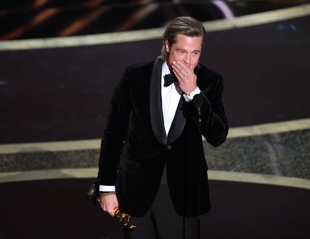 Brad Pitt appeared visibly moved as he accepted his first acting Oscar. The actor, who previously won for producing 12 Years a Slave in 2013, was honored in the best supporting actor category for his portrayal of stunt double Cliff Booth in Once Upon a Time in Hollywood. After thanking the Academy for the "honor of honors," Pitt praised the film's director, Quentin Tarantino, and his costar, Leonardo DiCaprio. "Leo, I'll ride on your coattails any day, man," he said. "The view is fantastic."
"The view is fantastic."
Pitt then proceeded to reflect on going to the movies with his parents as a child, as well as all the "wonderful people" he's met throughout his prolific career. He sweetly added, "Once upon a time in Hollywood — ain't that the truth?" Pitt ended his speech with a heartwarming mention of his six children. "This is for my kids, who color everything I do," he said. "I adore you."