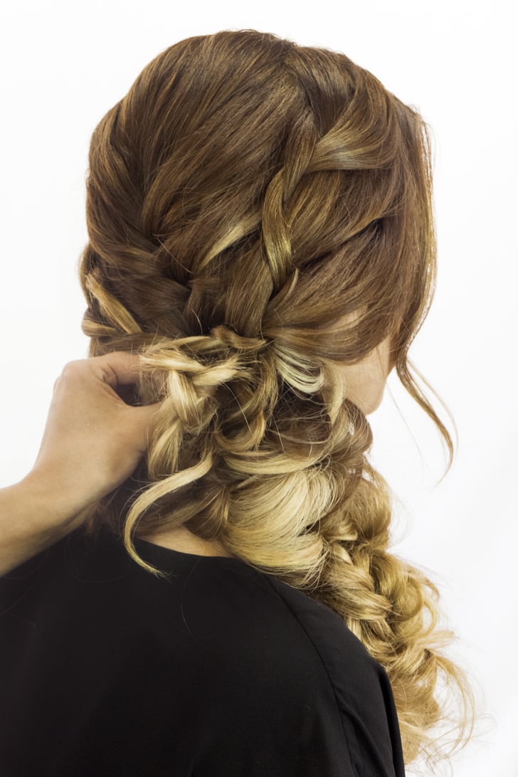 Scrunch the loose braid up to your scalp and secure it with bobby