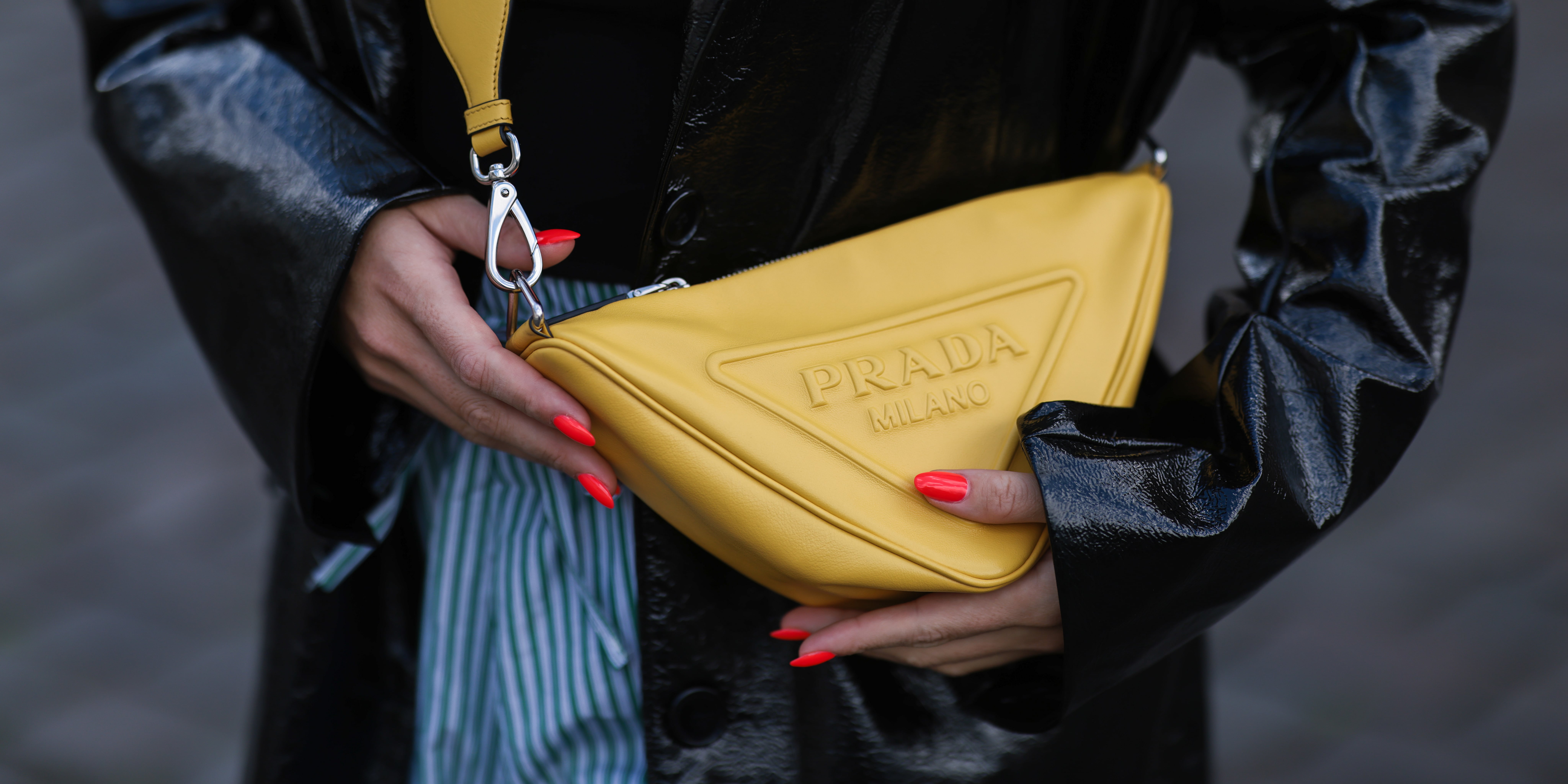 Cool girls are rocking the fluorescent trend with this Prada neon nylon bag