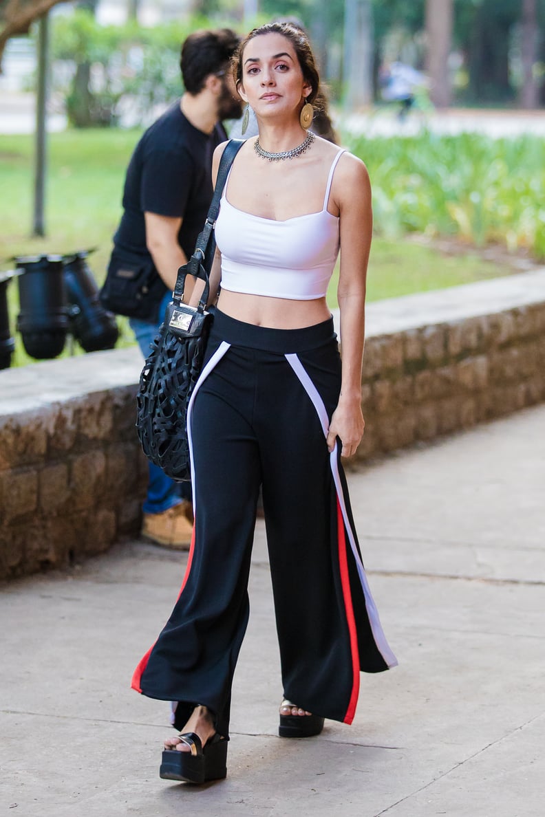 Style a White Tank With Flared Track Pants