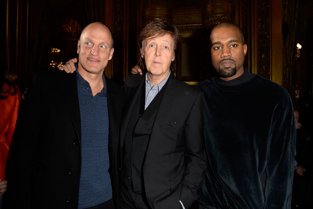 Paul McCartney posed with Kanye West and Woody Harrelson at his daughter Stella McCartney's runway presentation.