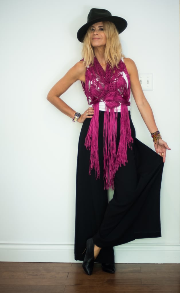 With a Maxi Skirt, a Fringed Top, a Wide-Brimmed Hat, and Black Booties