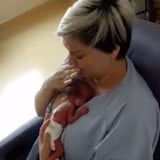 Mother Holding Premature Baby For the First Time