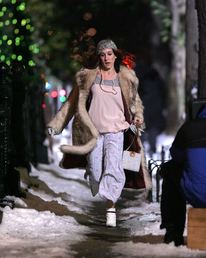 Carrie's PJ moment from Sex and the City: The Movie was decidedly more accessorised, what with a glitter beanie and bag, heeled booties, fur coat, white gloves, and a strand of pearls.