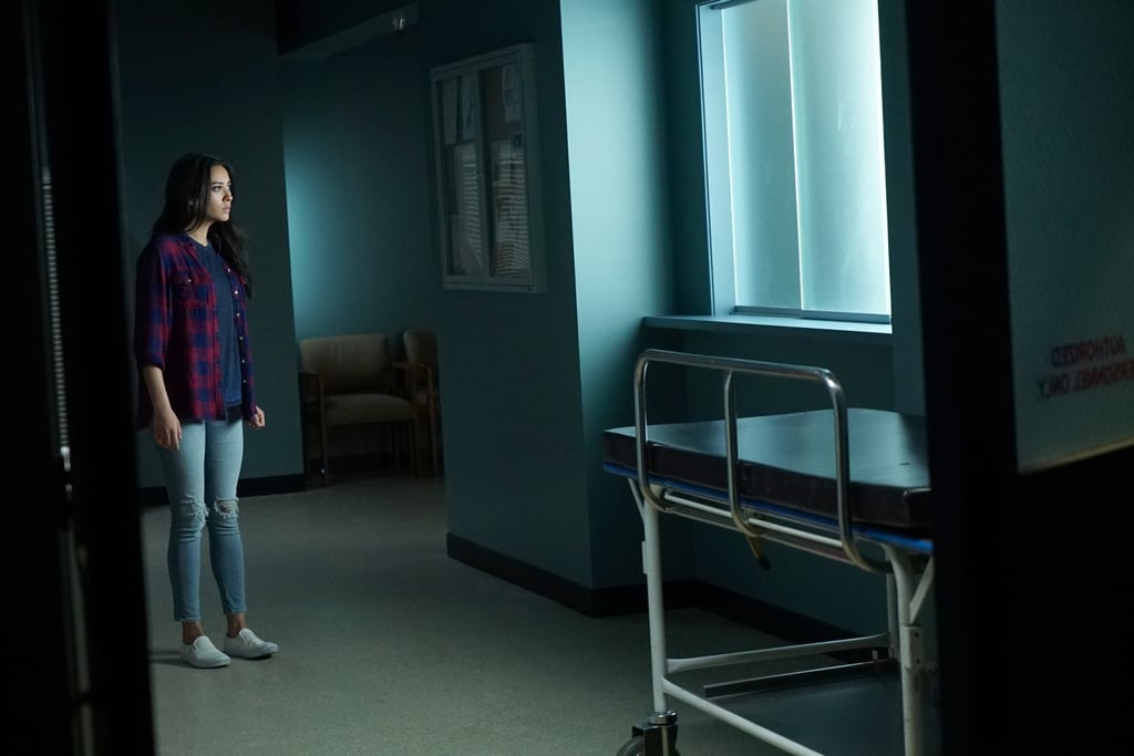 Emily's outfit proves a girl always needs a plaid shirt to layer with.