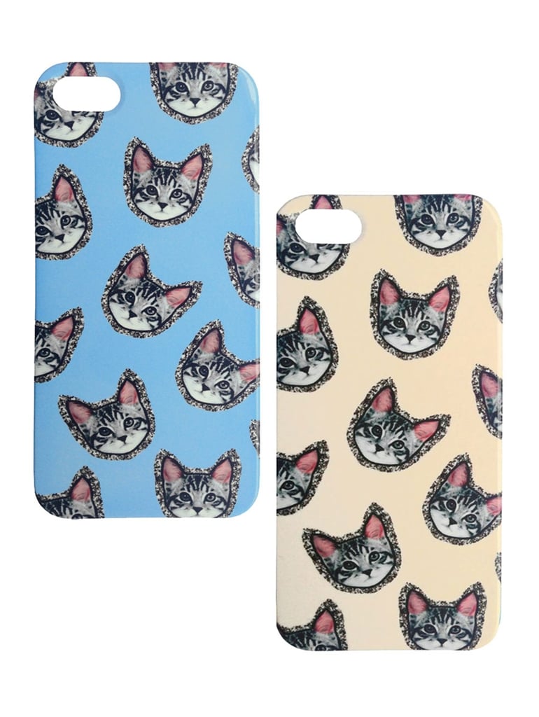 The glitter detail around the cats on these iPhone 5 cases ($90 each) is oh so appropriate.