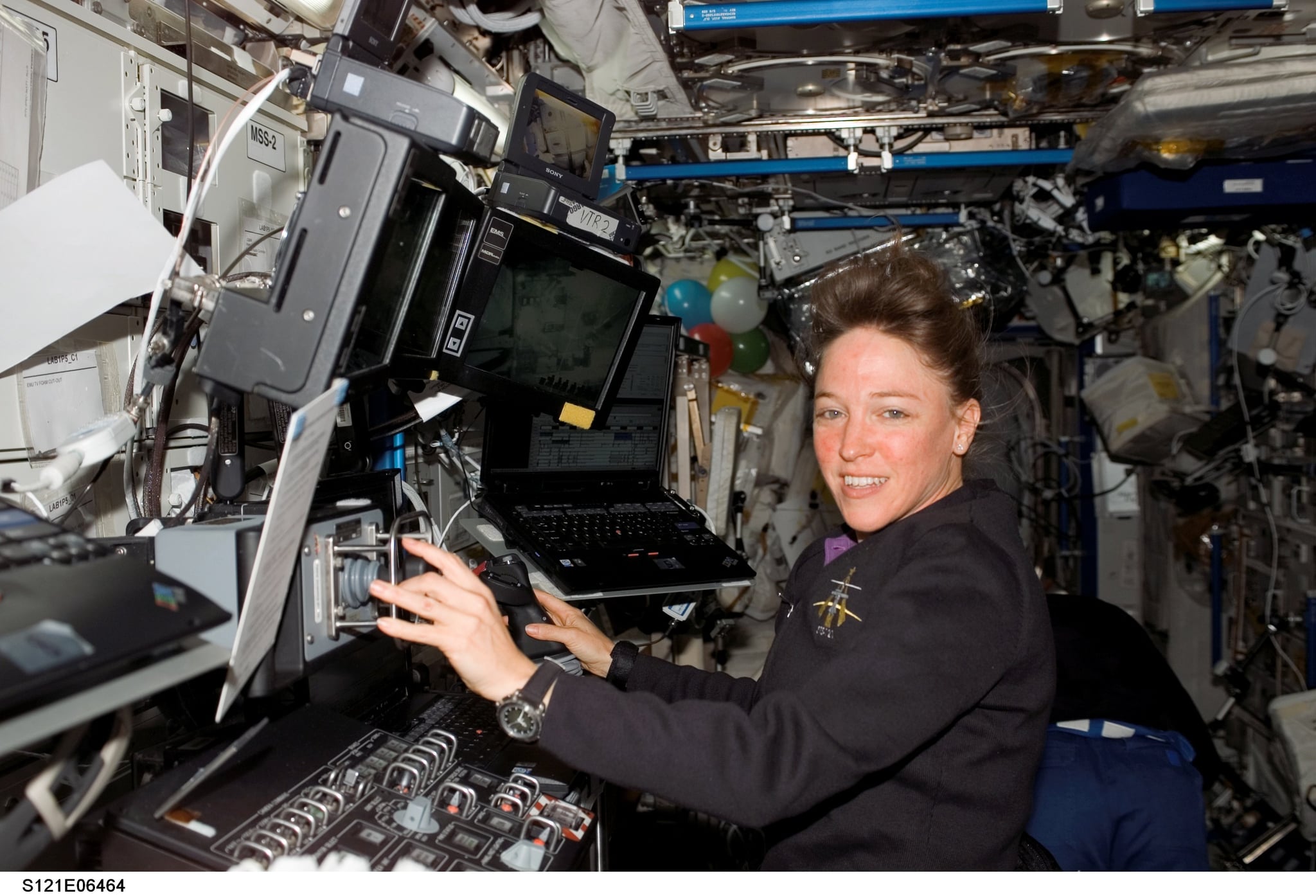 IN SPACE - JULY 13:  Mission specialist Lisa M. Nowak works at the Mobile Service System (MSS) and Canadarm2 controls in the Destiny laboratory of the International Space Station July 13, 2006. Nowak is a crew member aboard the Space Shuttle Discovery, which has been docked to the station since last week.  (Photo by NASA via Getty Images)