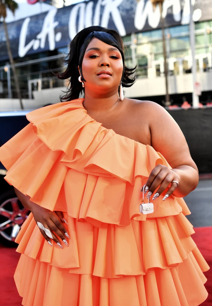 Lizzo's Miniature Valentino Bag and Orange Dress at the AMAs