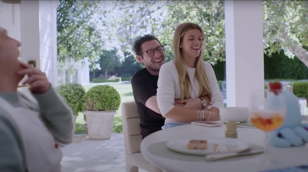 Richie Grainge enjoys dinner and drinks on the back patio with friends and her husband.
