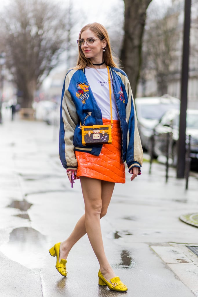 With a t-shirt, a printed jacket, and block heels.