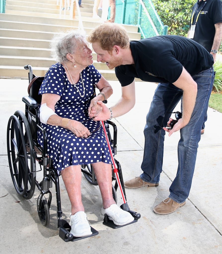 Prince Harry Kissing Elderly Woman's Hand at Invictus Games