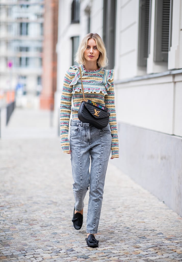 Loafers with tassels are your sweater with ruffle's new best friend. Separate the two with a pair of jeans.