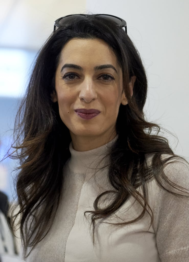 Amal Clooney Wearing a Red Coat