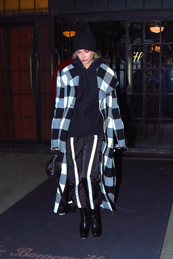 Hailey Baldwin covered up in a plaid coat that perfectly suited the cooler weather.