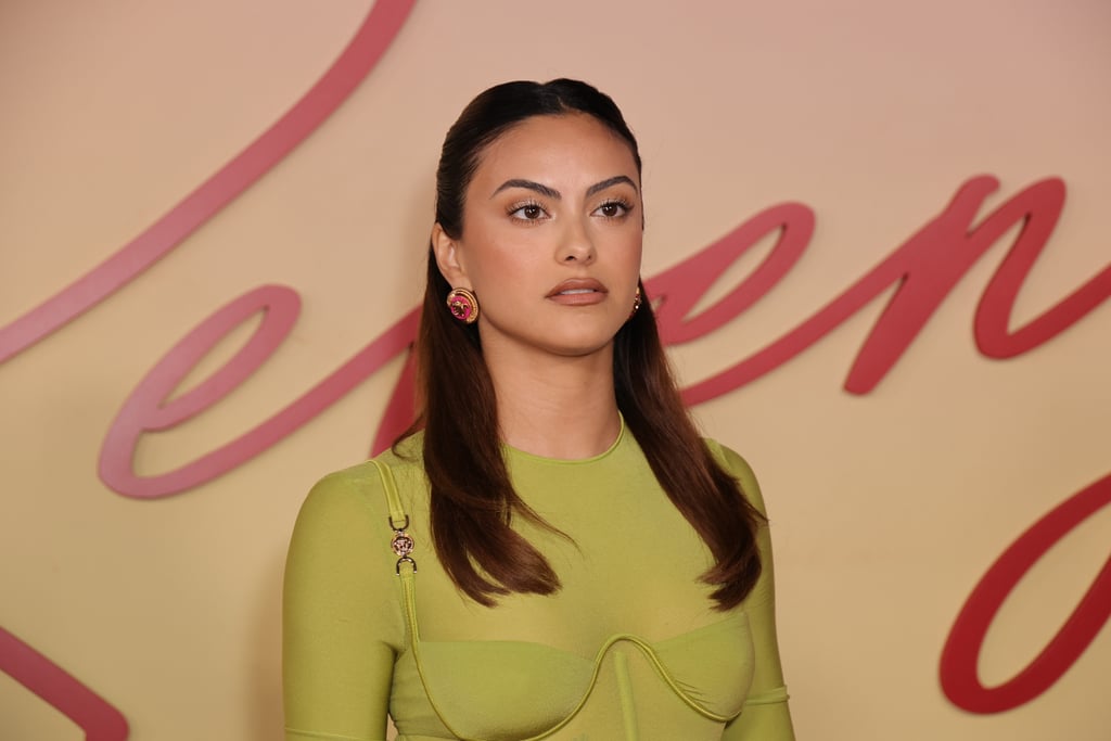 Camila Mendes Wears Green Versace Corset Top, Low-Rise Skirt