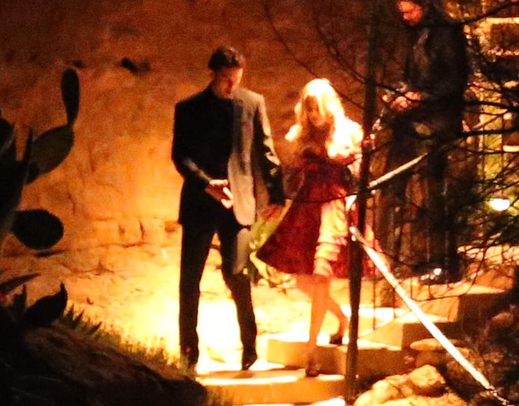 Ryan escorted Kaley down the stairs at their wedding bash.