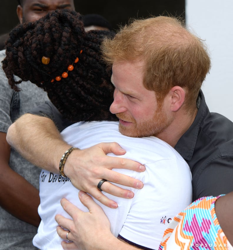 Harry let his emotions take over when he hugged a young girl during a visit to Zambia in 2018.