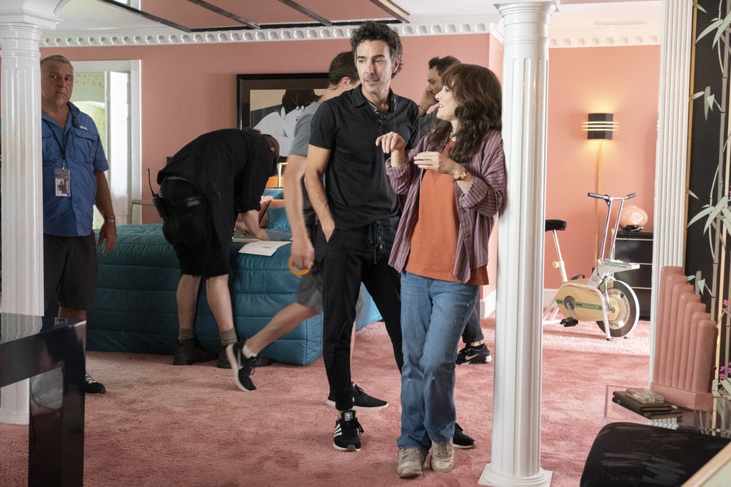 Winona Ryder and Shawn Levy speak while filming inside the set of Mayor Kline's home.
