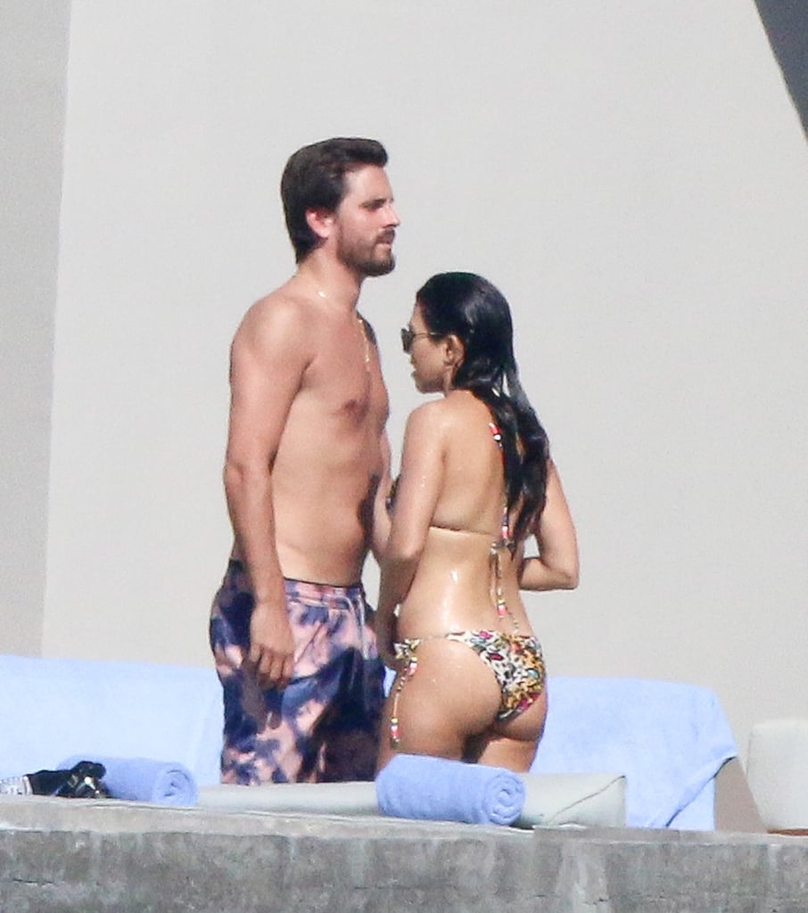 Kourtney Kardashian and Scott Disick were spotted relaxing poolside together in Los Cabos, Mexico over the weekend. On Saturday, the two were seen arriving at the airport on a private flight and later kicking back by the pool at their villa, with Kourtney showing off her figure in a printed bikini. While it may not have been a romantic getaway for the pair — Kourtney's Snapchat story showed that her and Scott's three kids were also on the trip — it has set more reconciliation rumors into motion; Kourtney and Scott called off their 10-year romance in July 2015 amid reports that Scott had cheated on her. Despite the split, the two have remained close and committed to co-parenting sons Mason and Reign and daughter Penelope. 

    Related:

            
            
                                    
                            

            20 Signs You&apos;re the Kourtney Kardashian of Your Friend Group