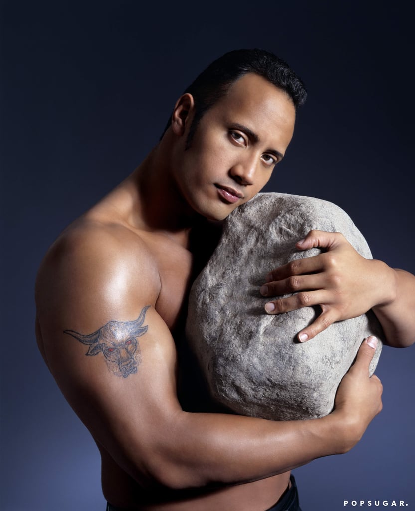 Dwayne Johnson Posing With a Rock Photos