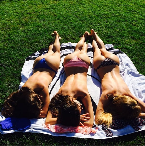 Topless girl latina sunbathing