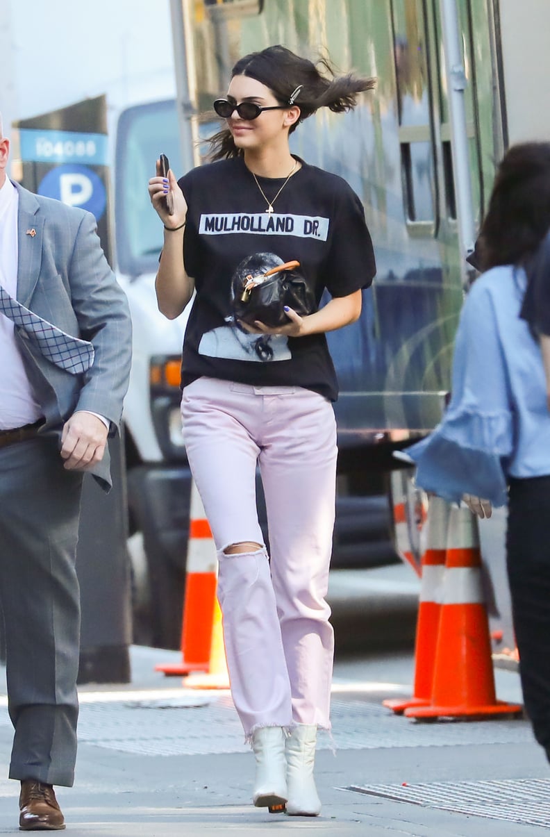 Her Colored Denim, Graphic Tees, and Tiny Sunglasses Work in Tandem