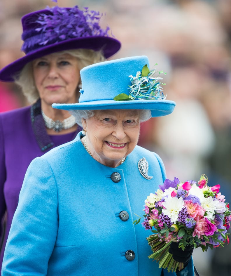 POUNDBURY, DORSET - OCTOBER 27:  Queen Elizabeth II and Camilla, Duchess of Cornwall tour Queen Mother Square on October 27, 2016 in Poundbury, Dorset.  (Photo by Samir Hussein/WireImage)