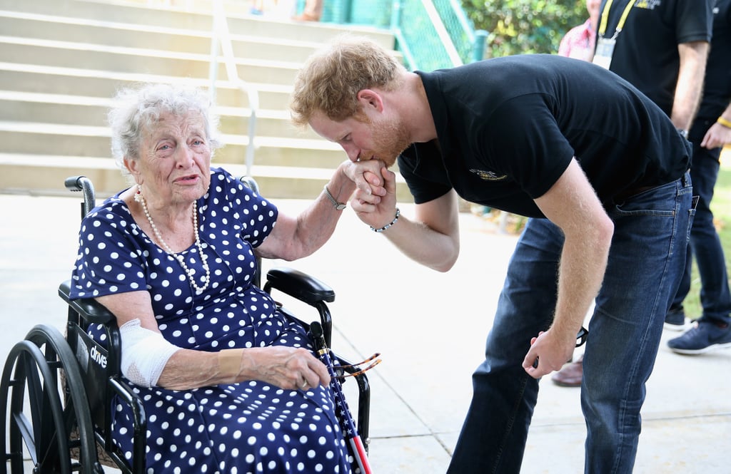 Prince Harry Kissing Elderly Woman's Hand at Invictus Games