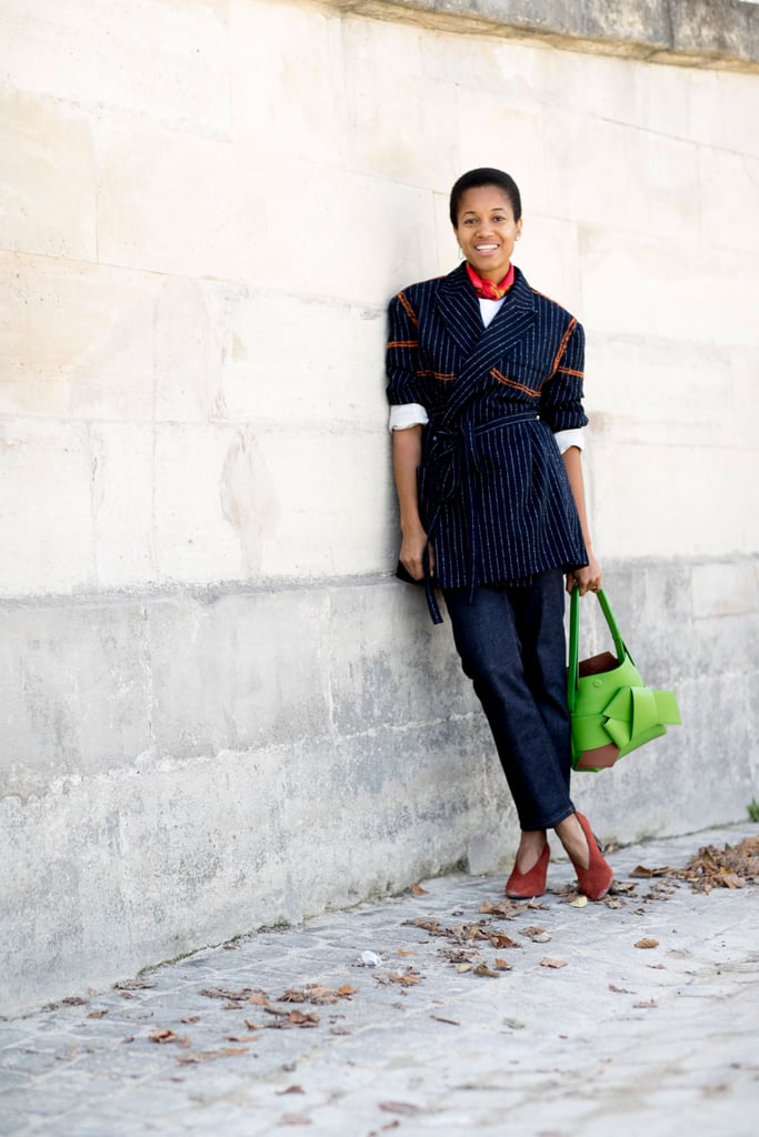 Tamu McPherson found small ways to play with the uniform — add a bandana, belt a blazer, or add interest with a bold bag. Work-appropriate doesn't have to be stuffy.