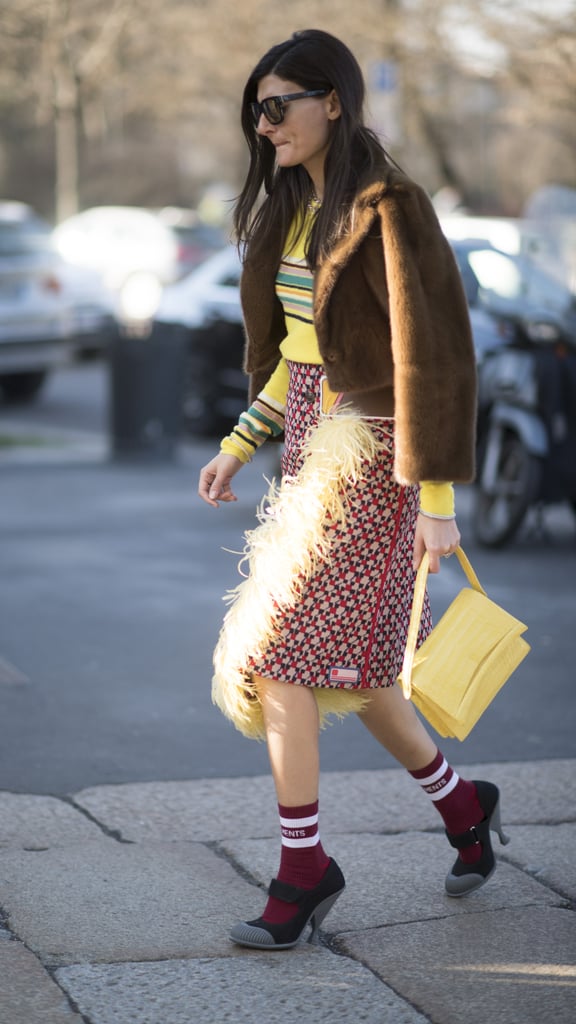 Not sure what to pair with a feather-lined skirt? How about a striped top in a complementary hue?