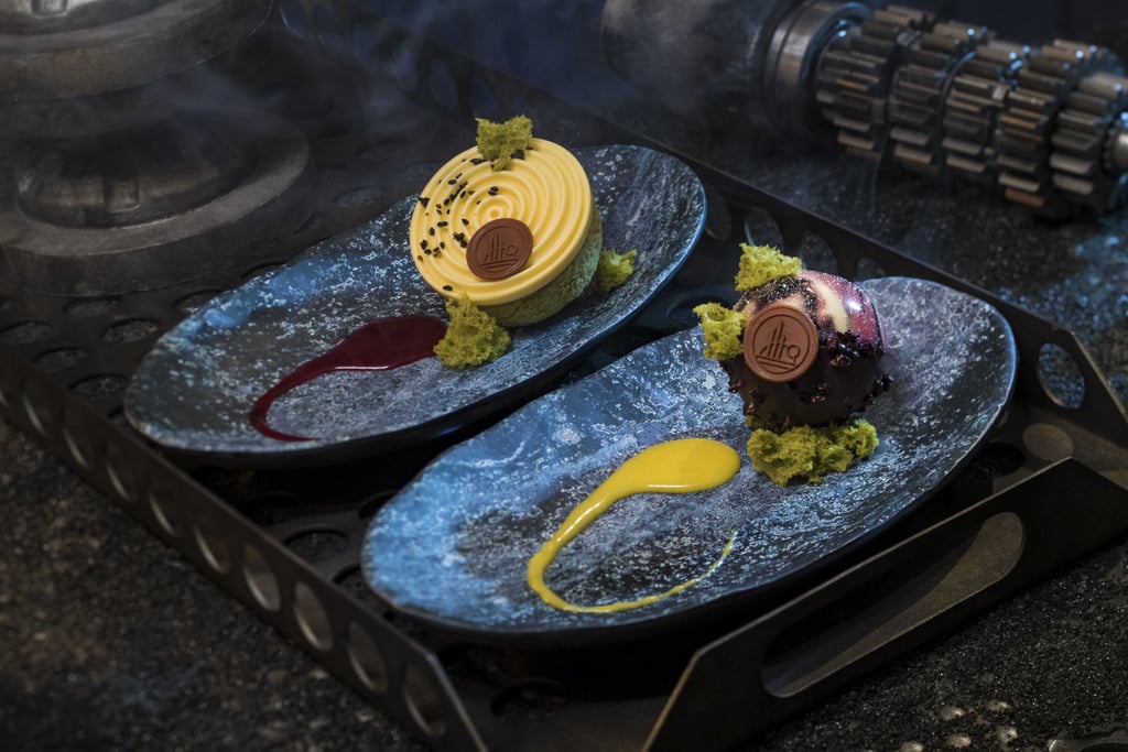 These desserts, a raspberry creme puff with passion fruit mousse (left) or chocolate cake with white chocolate mouse and coffee custard (right), can be found at Docking Bay 7 Food and Cargo.